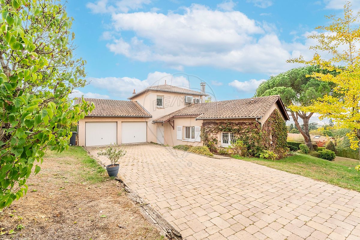 Maison 128 m² · à Jassans-Riottier · 128 m² · 447 000 €